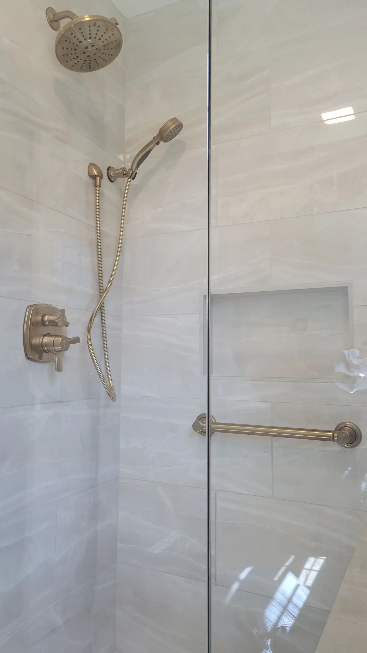 Bathroom remodel with tile and fixture installation by KMA Carpentry