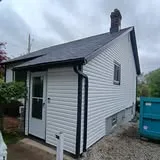 Small white outbuilding by KMA Carpentry