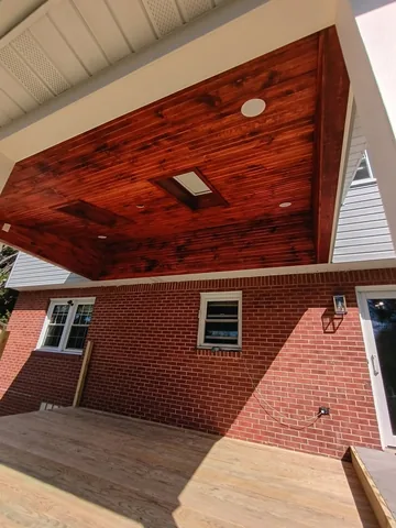 Porch roof project photo by KMA Carpentry