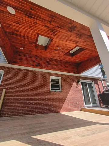 Porch roof project photo by KMA Carpentry