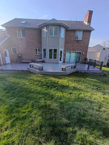 Trex deck with picture framing and railings by KMA Carpentry