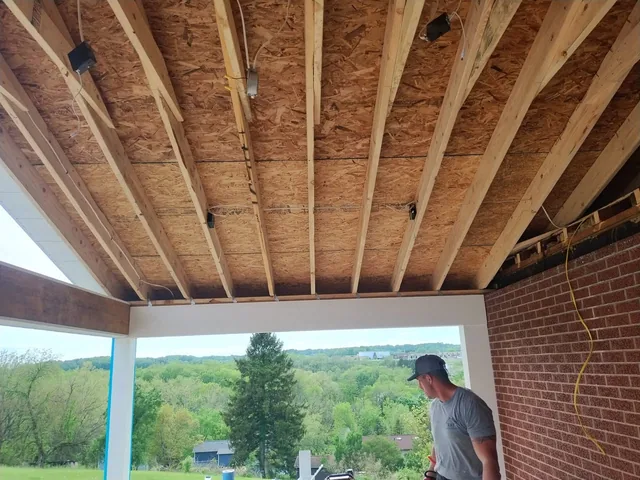 Porch roof project photo by KMA Carpentry